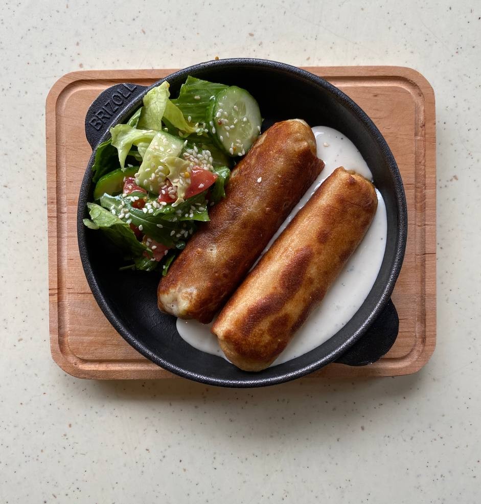 Запечені млинці з м'ясом